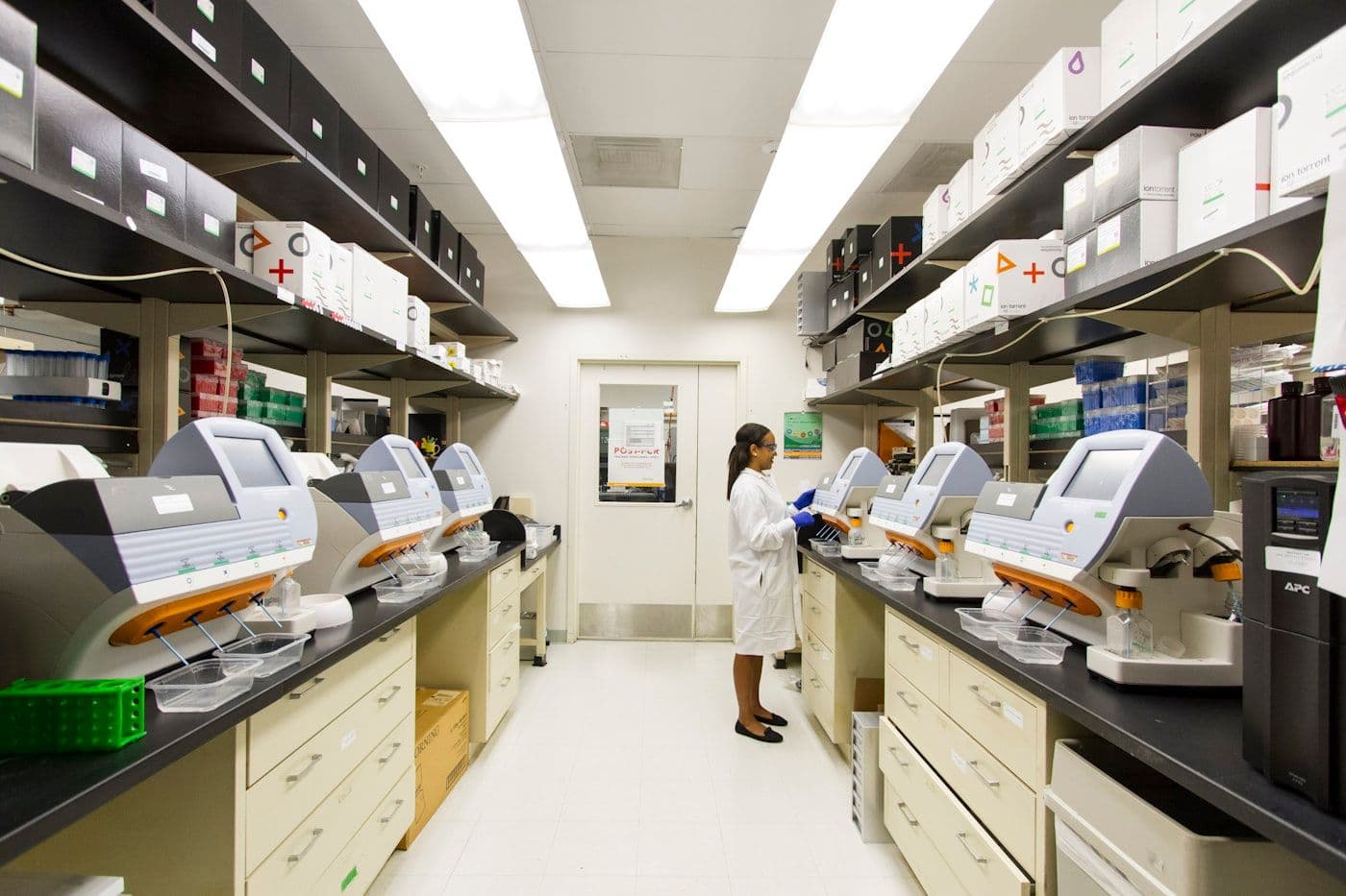 A team of doctors and young researchers collaborating in a modern clinical setting